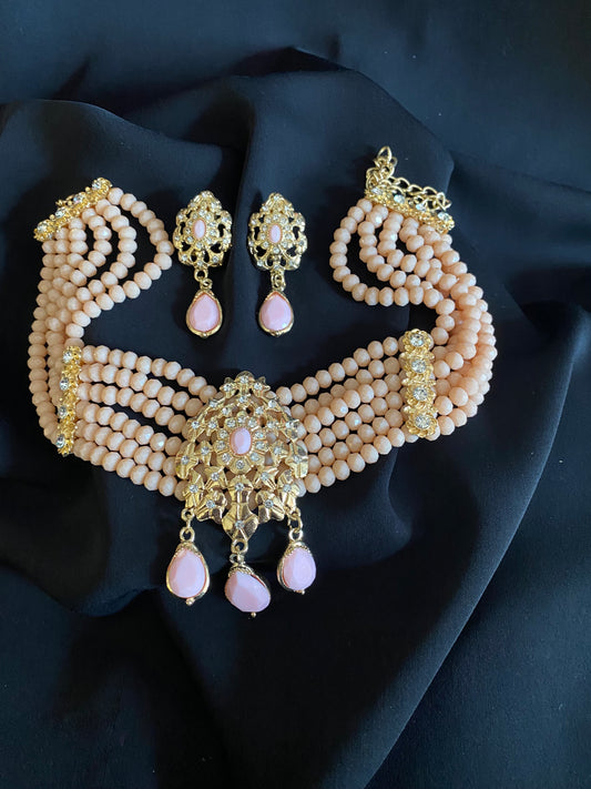 Ensemble Ras du cou et boucles d’oreille rose poudré